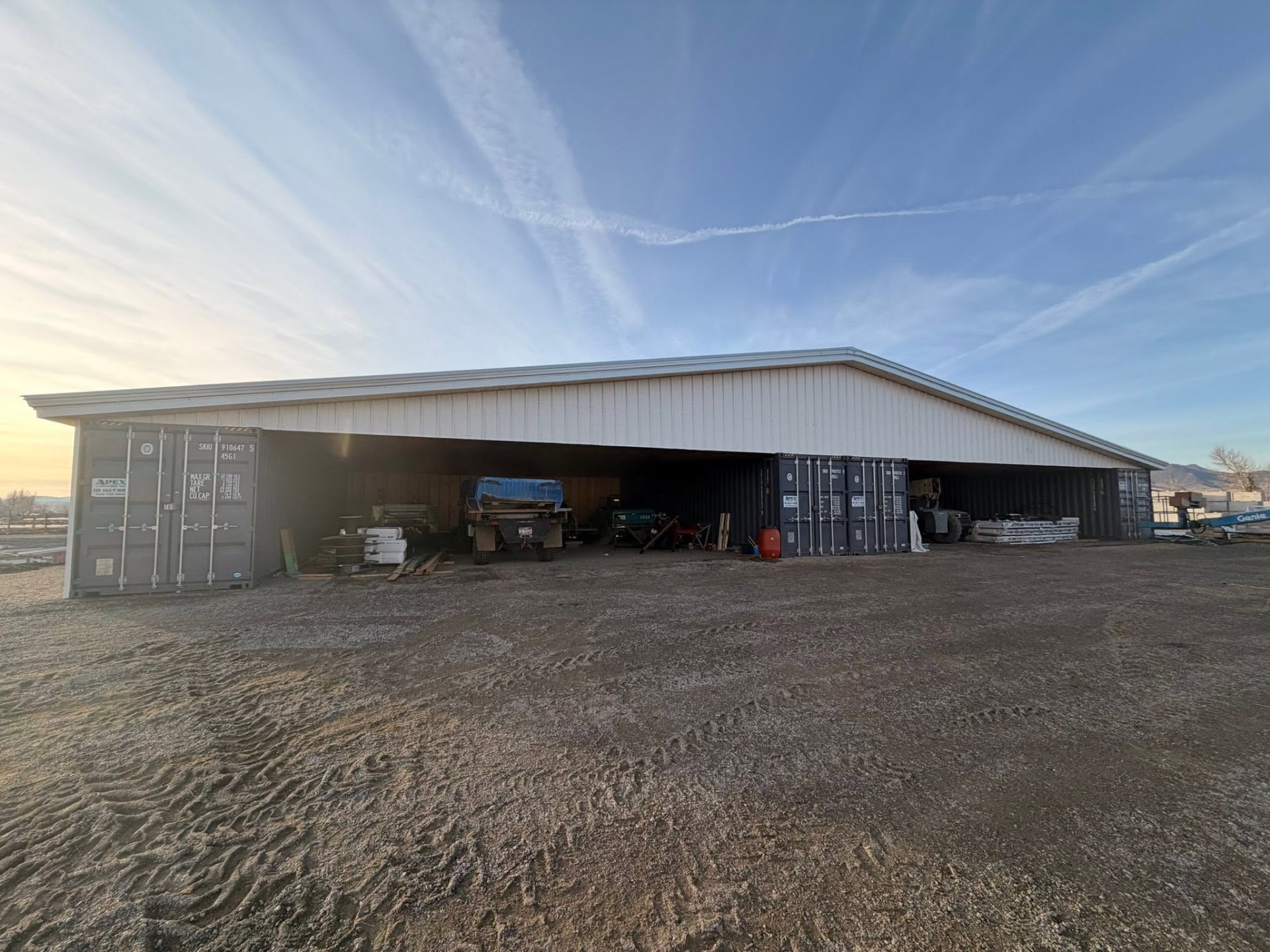 Large custom agricultural building with metal siding